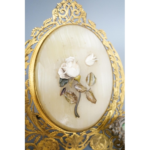 399 - An ormolu and hardstone mounted easel double photo frame, a glass and brass chamberstick, a Venice e... 