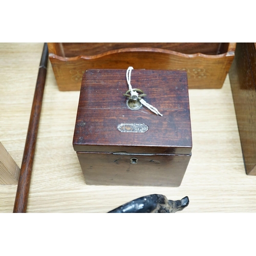 402 - A Georgian square mahogany tea caddy, a brass inlaid hardwood stationary rack and box, and sundry it... 