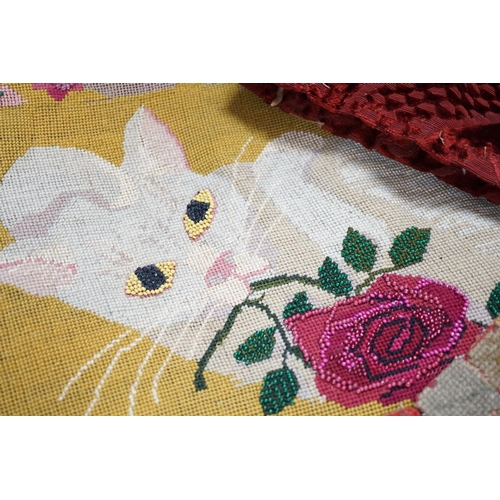 418 - A crewel work panel petit point of a cat and similar cartouche of a dog and various 19th century tex... 