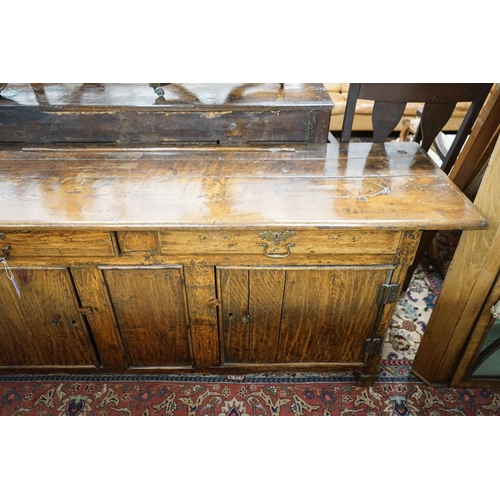 43 - An 18th century and later oak low dresser, length 182cm, depth 52cm, height 75cm