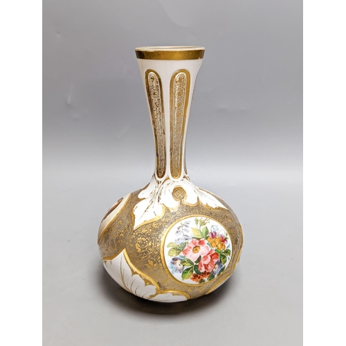 438 - A 19th century Bohemian enamelled overlaid glass vase, 22cm