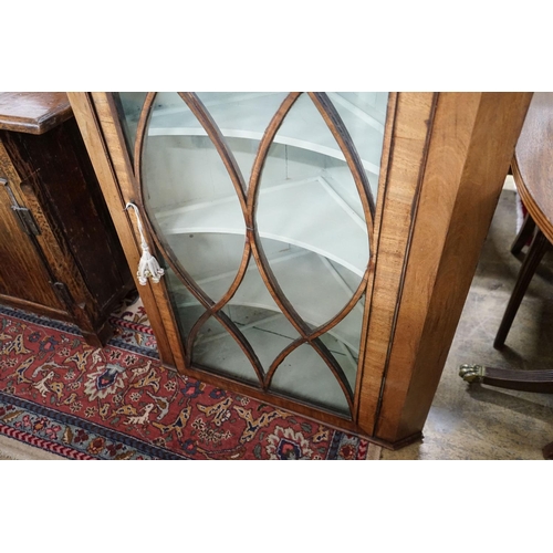 44 - A George III mahogany hanging corner cabinet, width 82cm, depth 46cm, height 127cm