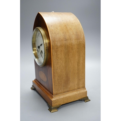 443 - An Edwardian mahogany mantel clock, lancet top case, with white enamelled dial. Key and pendulum. 29... 