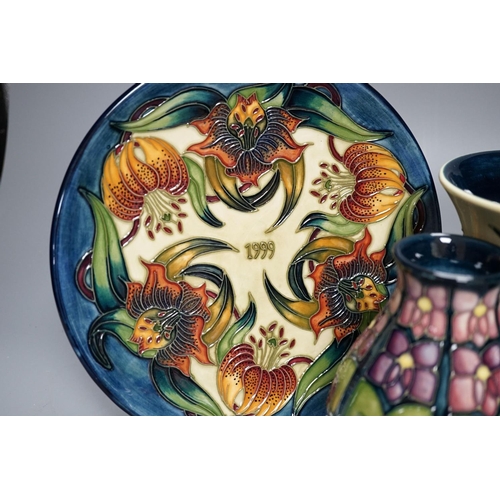 445 - Three modern Moorcroft vases, tallest 15.5 cm and a plate 22 cm