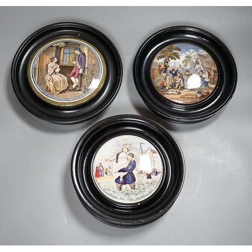 449 - Seven Prattware pot lids, mounted in ebonised wood frames, an F & R Pratt plate and two pot lids wit... 