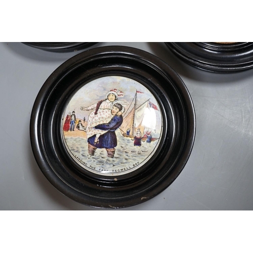 449 - Seven Prattware pot lids, mounted in ebonised wood frames, an F & R Pratt plate and two pot lids wit... 