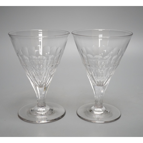 452 - A set of ten facet cut conical wine glasses, 14cm