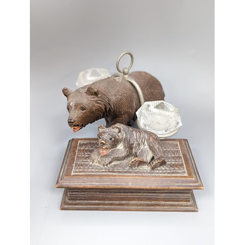 460 - A Black forest carved bear cruet, width 13cm, and a similar stampbox, early 20th century... 