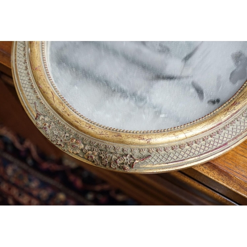 54 - A pair of Victorian style oval gilt framed wall mirrors, width 37cm, height 52cm