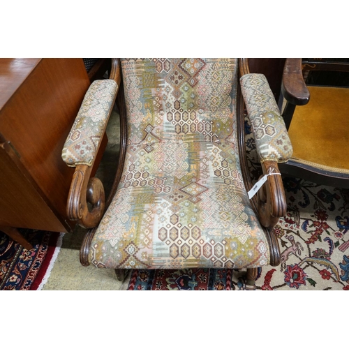 56 - A Regency mahogany scroll armchair