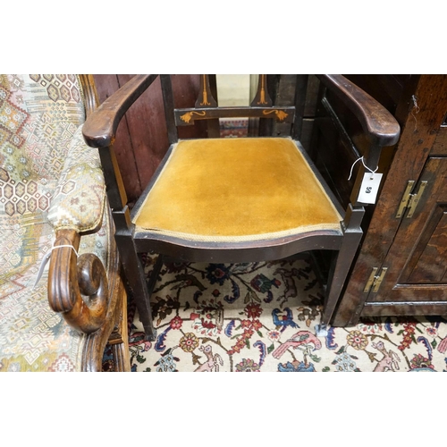 59 - An Edwardian Art Nouveau inlaid mahogany elbow chair, width 59cm, depth 58cm, height 109cm... 