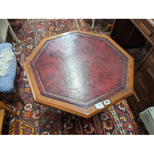 6 - A late Victorian walnut octagonal centre table, width 70cm, height 66cm