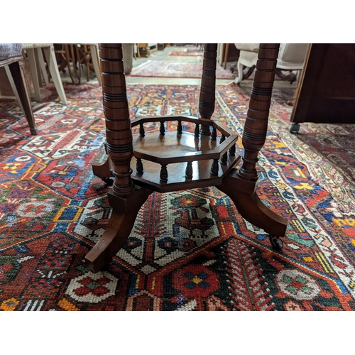 6 - A late Victorian walnut octagonal centre table, width 70cm, height 66cm