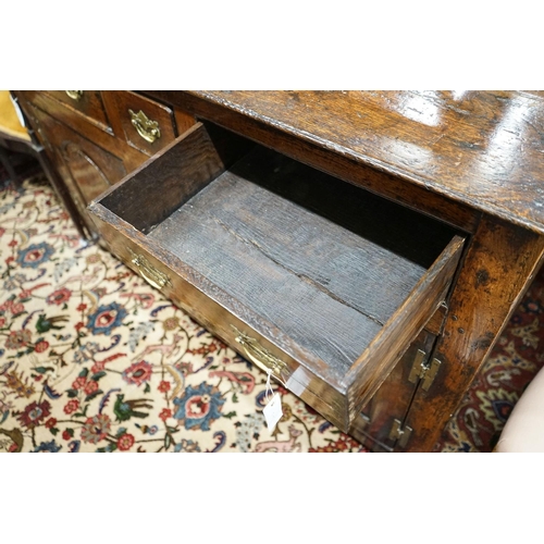 60 - A mid 18th century oak dresser base, length 140cm, depth 55cm, height 88cm