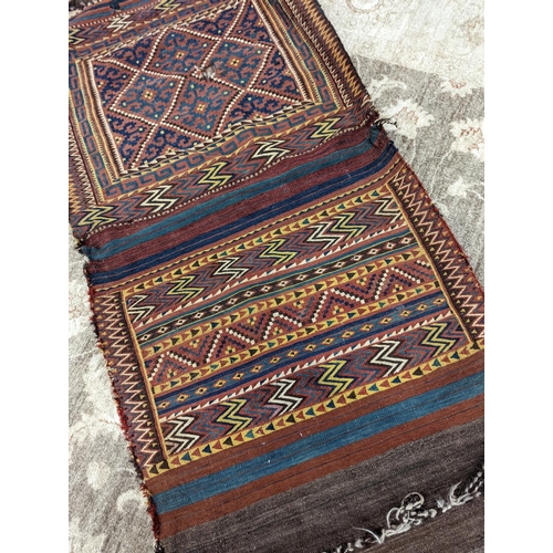 66 - An Afghan Kelim bag/wall hanging, 280 x 78cm