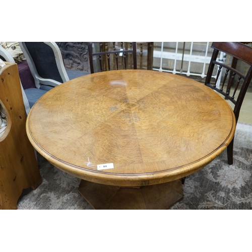 84 - An Art Deco burr walnut circular low table with figured segmented veneered top, diameter 120cm, heig... 