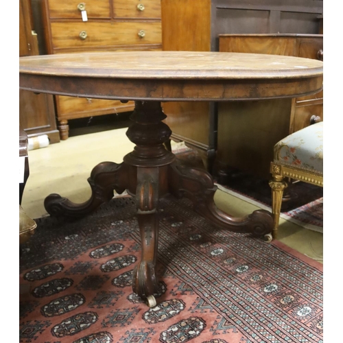 91 - A Victorian oval figured walnut tilt top loo table, width 135cm, depth 100cm, height 72cm... 