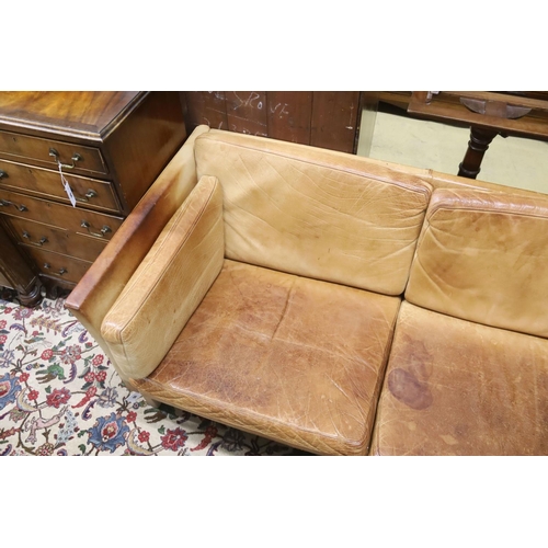 95 - A Danish Borge Mogensen style tan leather three seater sofa, length 218cm, depth 78cm, height 66cm... 