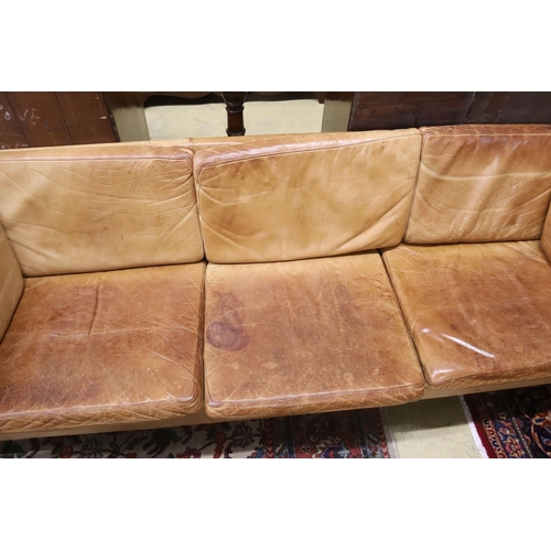 95 - A Danish Borge Mogensen style tan leather three seater sofa, length 218cm, depth 78cm, height 66cm... 