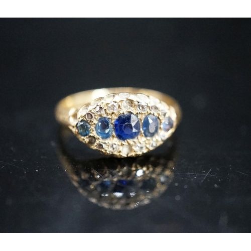 967 - An early 20th century 18ct gold, graduated five stone sapphire and rose cut diamond set cluster ring... 