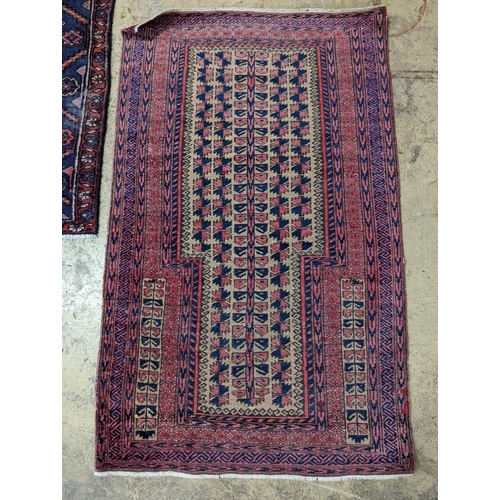 100 - A Bokhara red ground rug and a Belouch prayer rug, larger 144 x 88cm