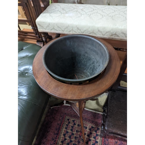 101 - An Edwardian inlaid mahogany jardiniere with associated brass liner, height 92cm