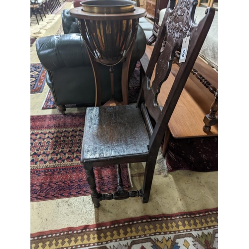 102 - A 17th century style Continental oak back stool, width 40cm, depth 34cm, height 102cm