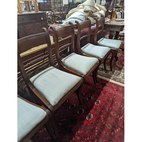 106 - A set of six Regency mahogany dining chairs with rope twist backs