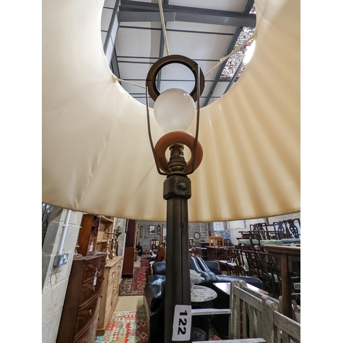 122 - A contemporary wrought iron standard lamp, height 137cm