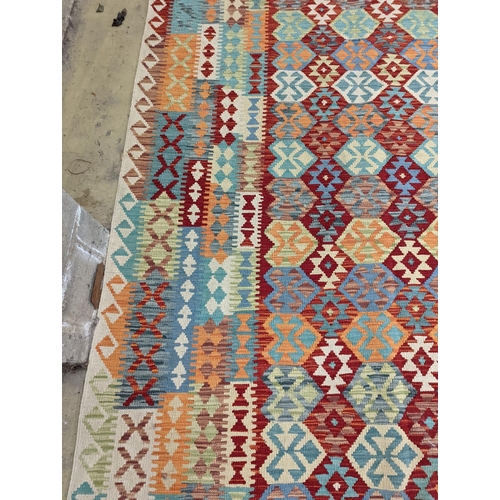 124 - An Anatolian Kilim flatweave carpet, 390 x 300cm