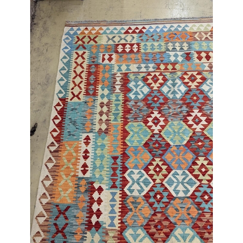 124 - An Anatolian Kilim flatweave carpet, 390 x 300cm