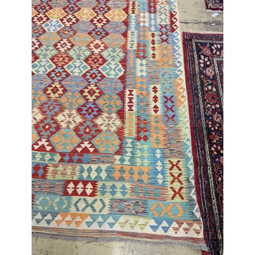 124 - An Anatolian Kilim flatweave carpet, 390 x 300cm