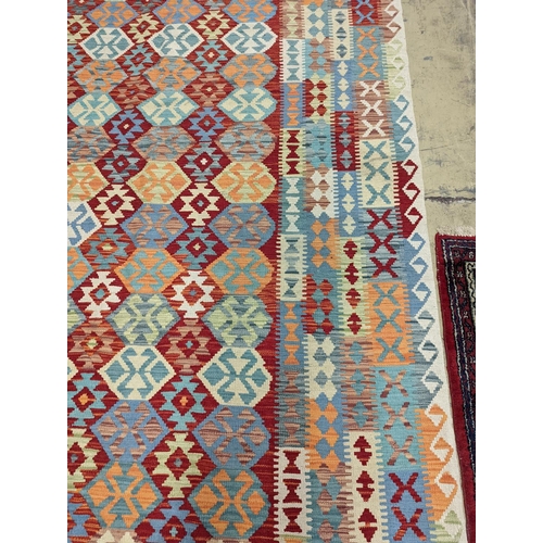 124 - An Anatolian Kilim flatweave carpet, 390 x 300cm