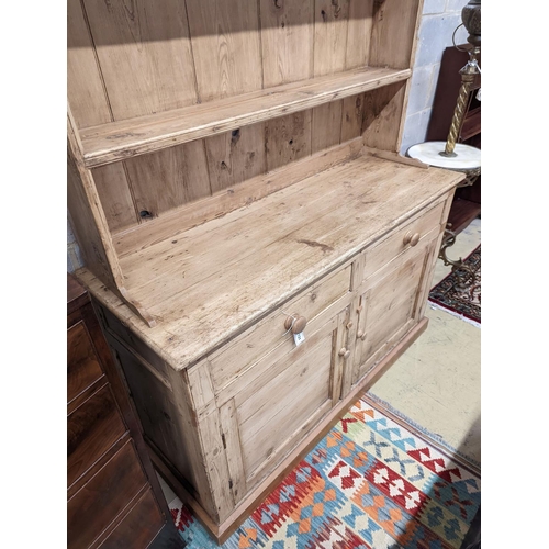 131 - A Victorian and later pine dresser, length 140cm, depth 52cm, height 190cm