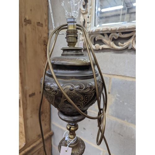 133 - A late Victorian cast brass and onyx oil lamp standard, the column with an alabaster mid tier, raise... 