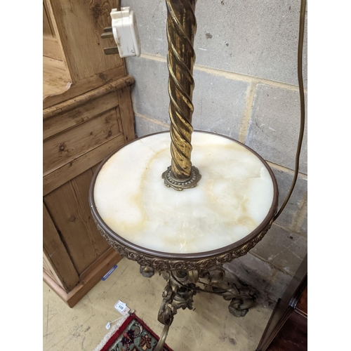 133 - A late Victorian cast brass and onyx oil lamp standard, the column with an alabaster mid tier, raise... 