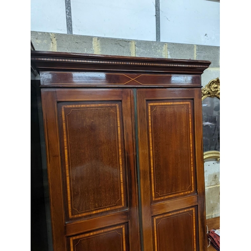 137 - A Edwardian satinwood banded mahogany two door bookcase, width 83cm, depth 31cm, height 198cm... 