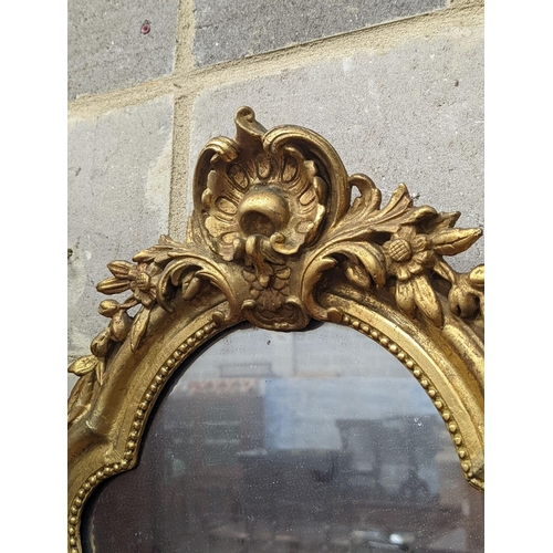 138 - A 19th century French giltwood and gesso cartouche wall mirror, width 51cm, height 66cm