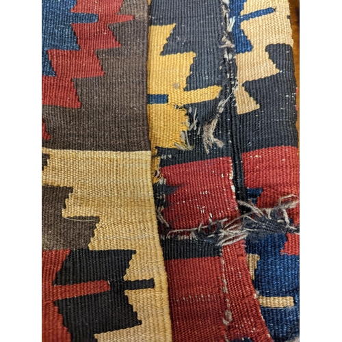 139 - Two Kilim polychrome flatweave rugs, larger 200 x 130cm