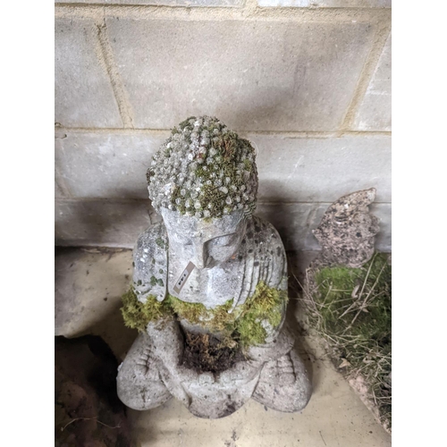 144 - A reconstituted stone seated Buddha bird bath, height 64cm