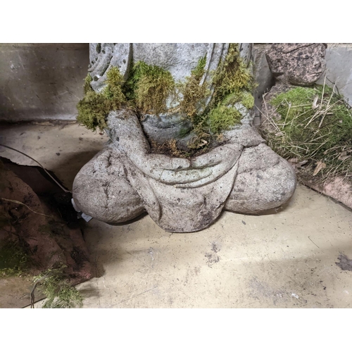 144 - A reconstituted stone seated Buddha bird bath, height 64cm