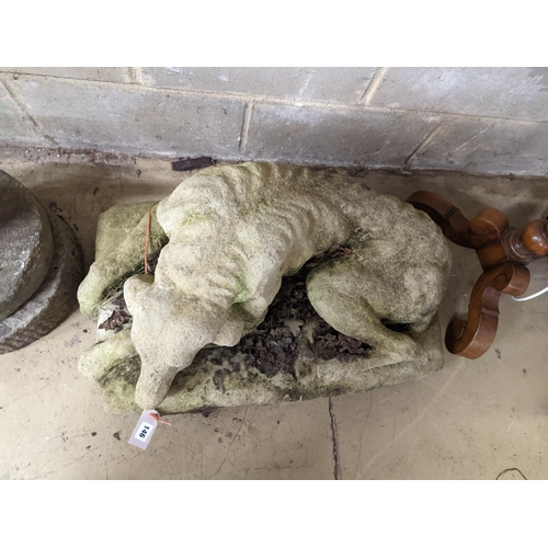 146 - A reconstituted stone recumbent hound garden ornament, width 80cm, depth 42cm, height 44cm... 