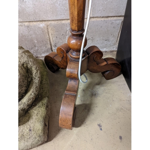 148 - A 1920's Italian style burr walnut veneered tripod standard lamp, height 145cm