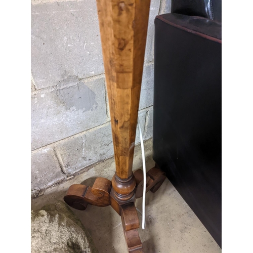 148 - A 1920's Italian style burr walnut veneered tripod standard lamp, height 145cm