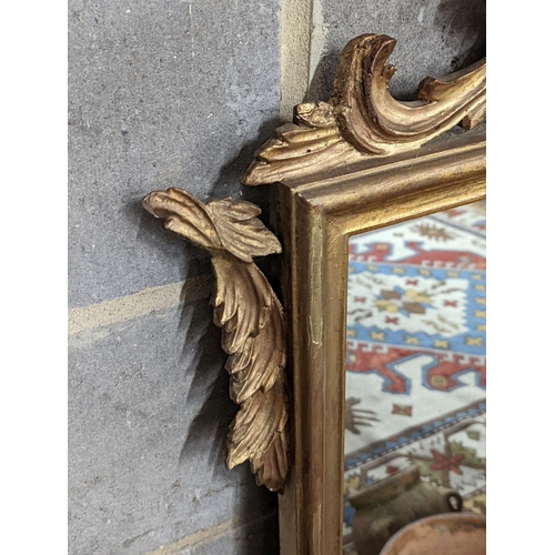 156 - A 1930's French carved giltwood wall mirror, width 80cm,