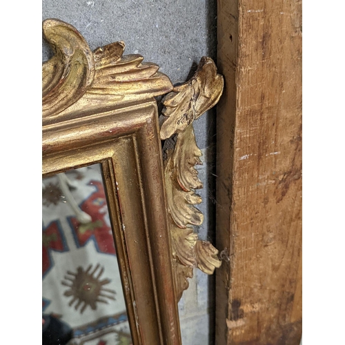 156 - A 1930's French carved giltwood wall mirror, width 80cm,