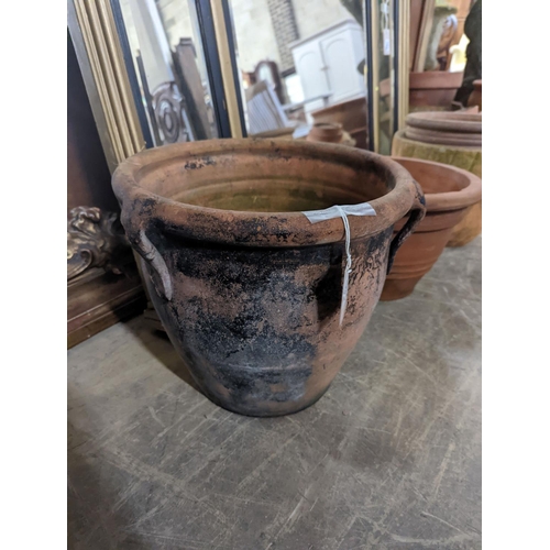 160 - A collection of approximately 20 assorted terracotta garden planters, largest diameter 35cm... 