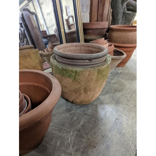 160 - A collection of approximately 20 assorted terracotta garden planters, largest diameter 35cm... 