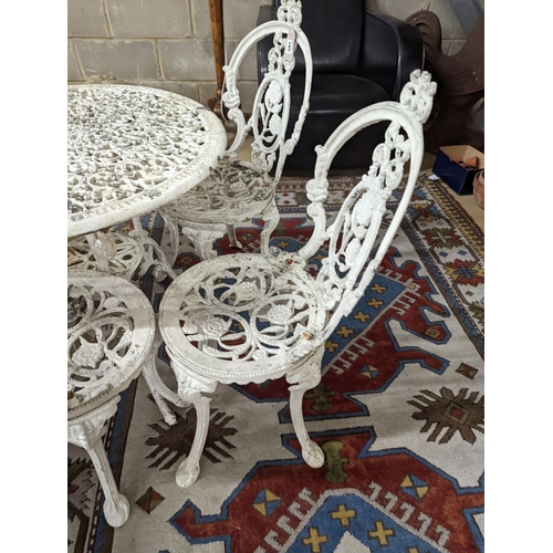 165 - A Victorian style painted aluminium circular garden table, diameter 72cm, together with four chairs... 