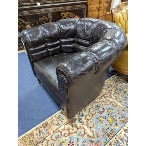 174 - A black leather tub framed club armchair, width 88cm, depth 76cm, height 76cm